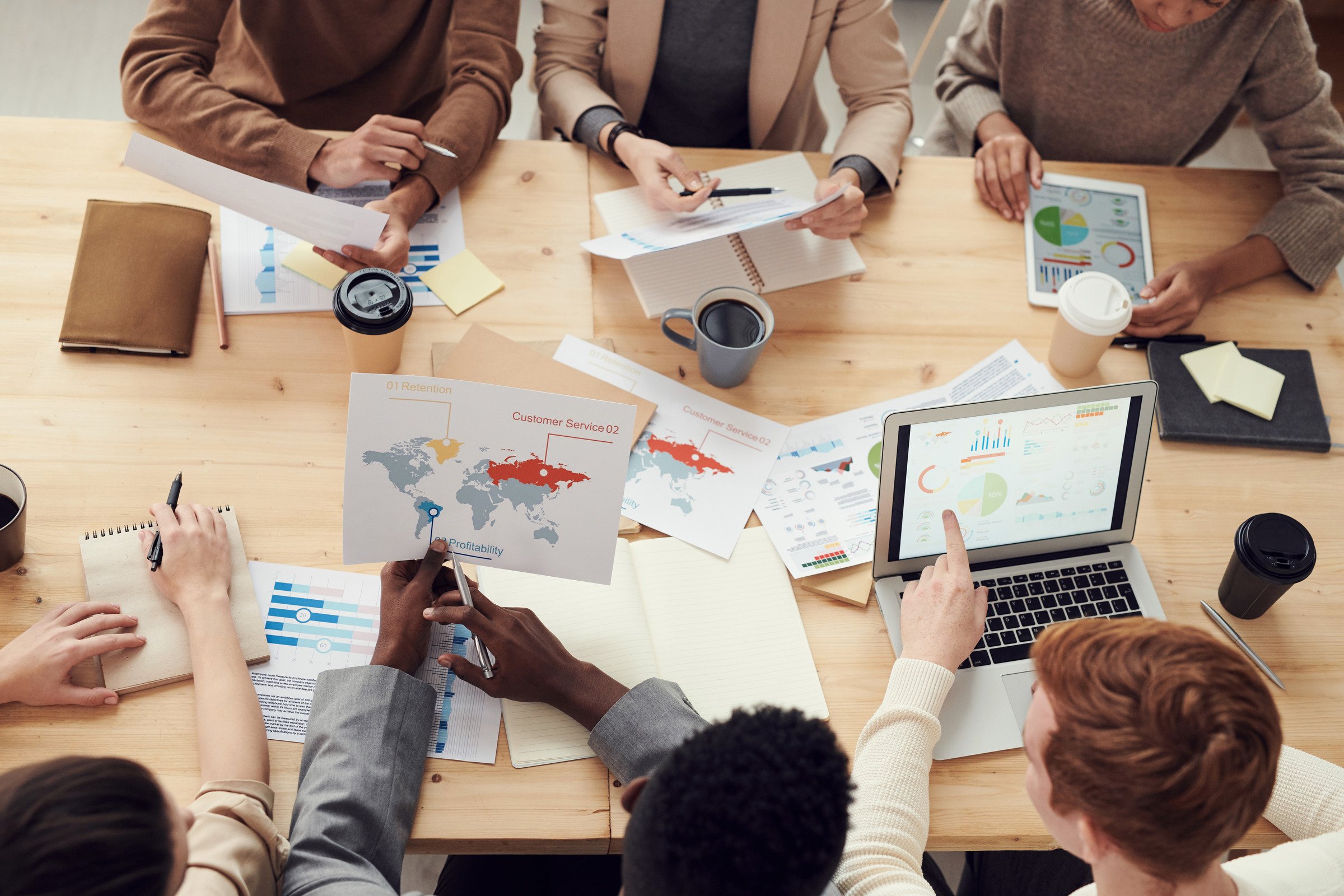 Image 2: a group of people brainstorming